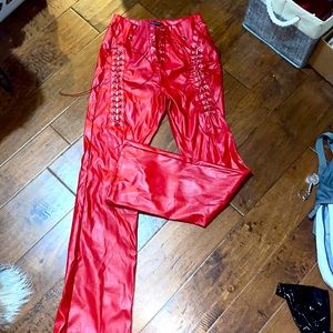 Red lace up faux leather pants